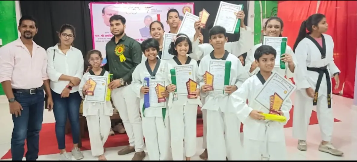 Students holding certificates